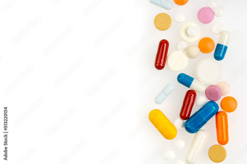 Set of different colorful pills and capsules isolated on white background. Copy space for text. Set of different colorful pills and capsules isolated on white background. Copy space for text.