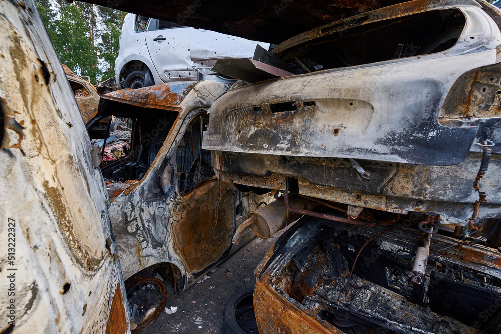 Stack of cars, destroyed during Russian occupation of Irpin and Bucha