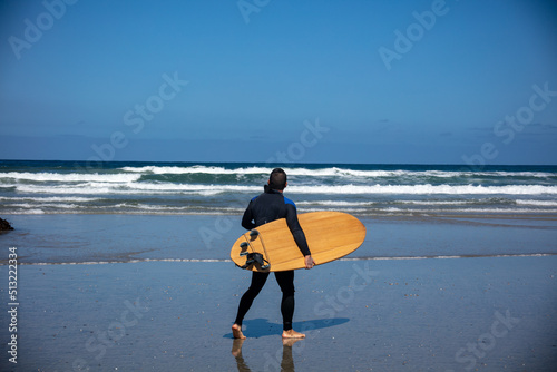 Torrey Pines State Beach, California, with a Surfer Surveying the Surf Zone