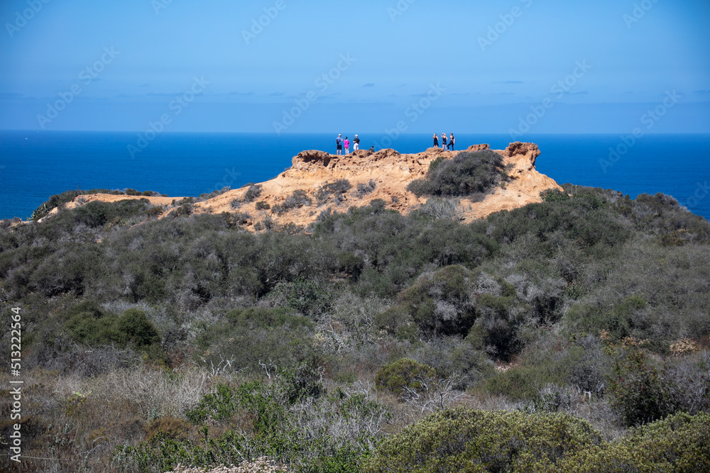 Hikers Exploring the Trails Near Sand Diego, California, at Torrey Pines State Reserve at Razor Point Hikers Exploring the Trails Near Sand Diego, California, at Torrey Pines State Reserve at Razor Point