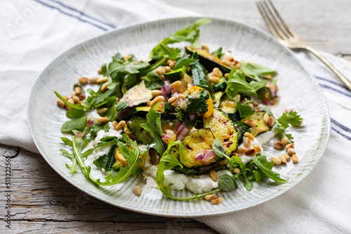 Baby courgette salad on ricotta cheese