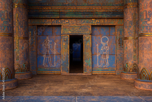 Fotografia Entrance doorway to ancient Egyptian tomb or temple with blue and gold painted decorative columns and walls