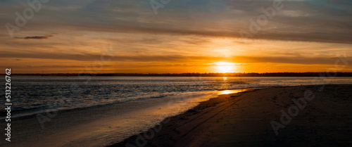 sunset on the beach © Sarah