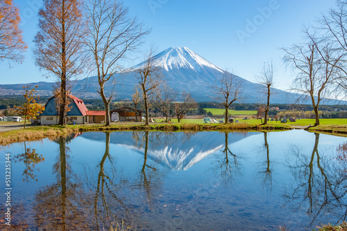 Scenic view of Fuji mountain reflection in Autumn morning at Fumotoppara Campground, Fujinomiya, Shizuoka, Japan photo