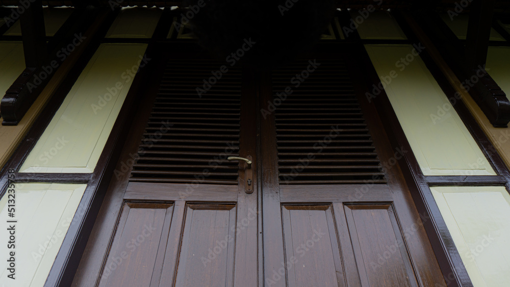 Low angle view of a door of the house Low angle view of a door of the house