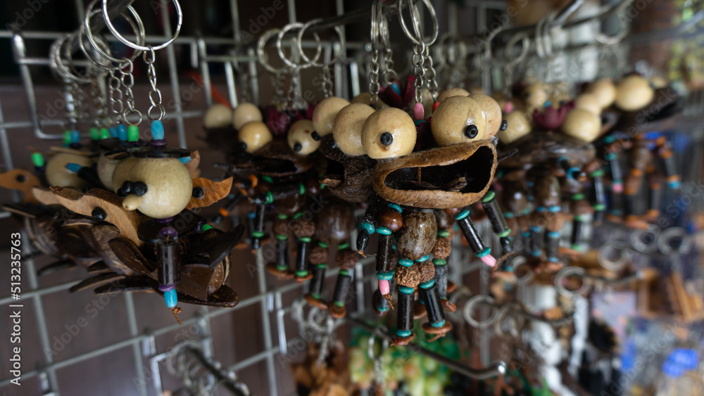 Collection of handmade key chains from recycled material in the shop