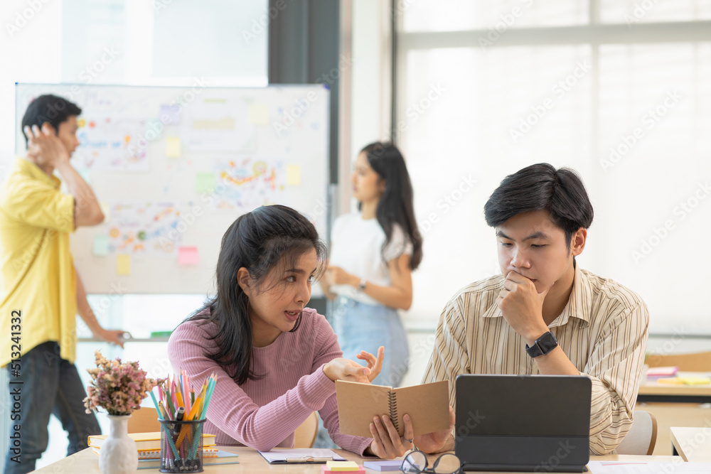 Diverse asian young startup business brainstorming , sharing idea in a meeting. Diverse asian young startup business brainstorming , sharing idea in a meeting.