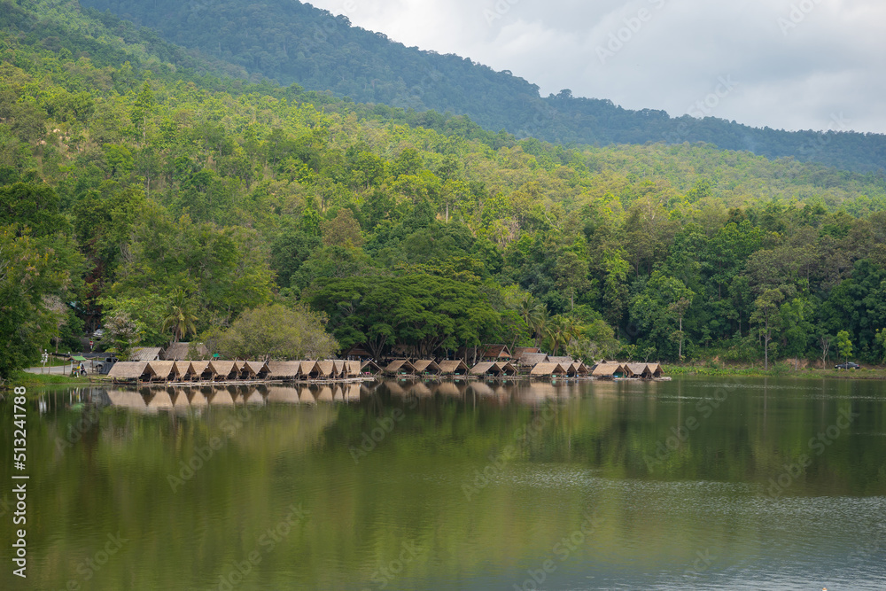 Fototapeta premium Huay Tueng Tao Park is a public place for people to relax and a tourist attraction for rafts selling food by the water and a variety of outdoor activities in Chiang Mai, Thailand.