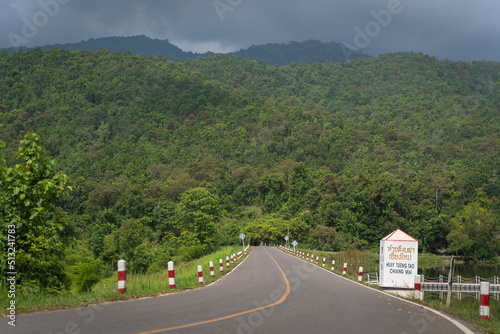 The road on the reservoir of the Huay Tueng Tao Park is the name of a public place for people to relax and tourist attraction with a mountain range forest in Chiang Mai, Thailand.