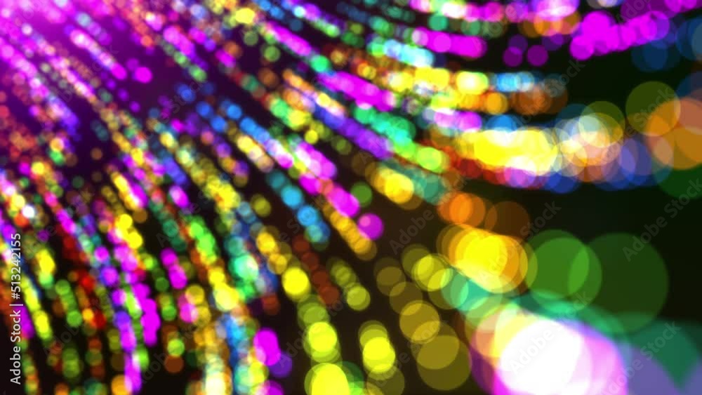Seamless loopAbstract colorful motion glow circle de-focus light trail with multi-color particles background.