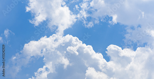 Fototapeta Naklejka Na Ścianę i Meble -  White and fluffy clouds on a blue sky