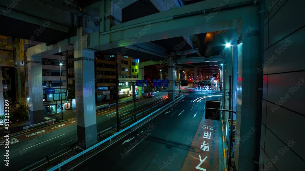 A night timelapse of the traffic on the urban street in Ikejiriohashi wide shot tilt A night timelapse of the traffic on the urban street in Ikejiriohashi wide shot tilt