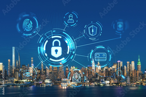 New York City skyline from New Jersey over the Hudson River with the skyscrapers at night, Manhattan, Midtown, USA. The concept of cyber security to protect confidential information, padlock hologram