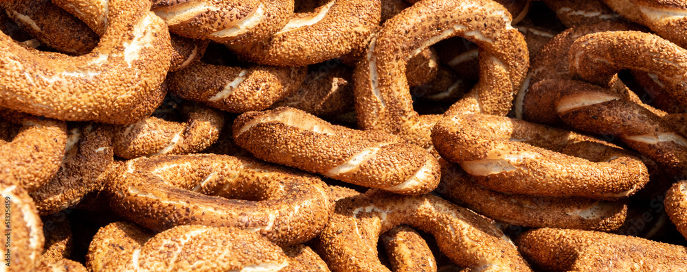 Closeup view of simit (circular bread), a popular street food among tourists and residents in Turkey. Banner