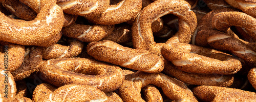 Closeup view of simit (circular bread), a popular street food among tourists and residents in Turkey. Banner photo
