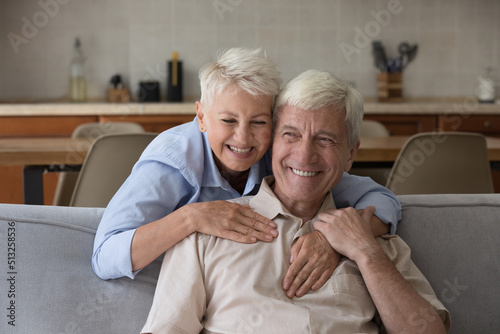 Portrait older wife hugs husband laughing, spend time together Fototapet