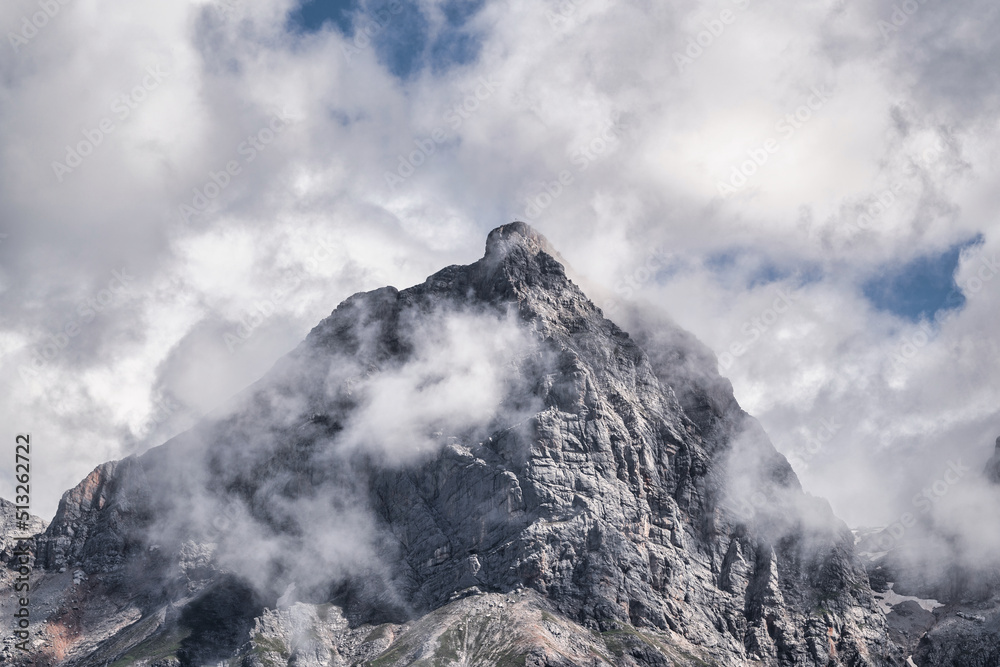 Beautiful summer landscape with dramatic clouds in the sky over impressive mountains - Hochkönig Austria