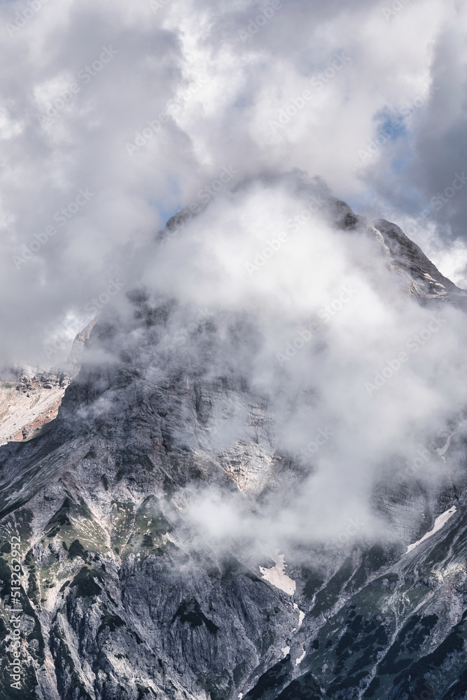 Beautiful summer landscape with dramatic clouds in the sky over impressive mountains - Hochkönig Austria