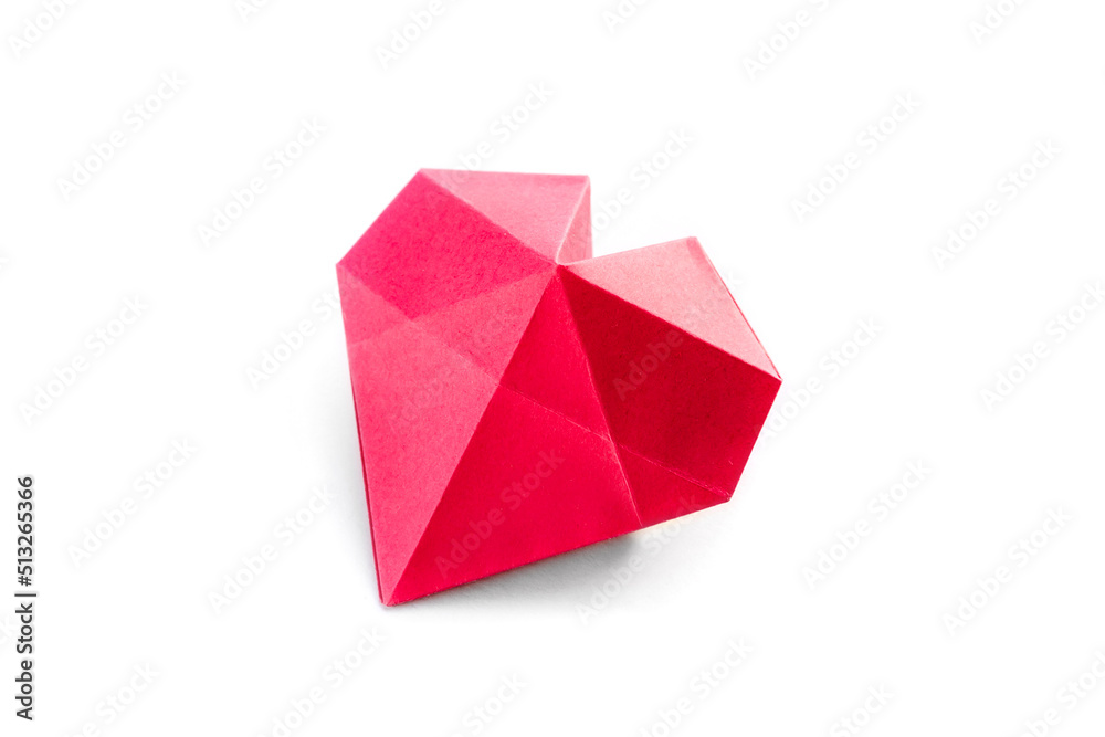 Red paper heart origami isolated on a white background Red paper heart origami isolated on a white background