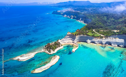 Ionian islands of Greece. Corfu aerial drone view of stunning Cape Drastis - natural beuty landscape with white rocks and turquoise waters, northern part of Corfu island.
