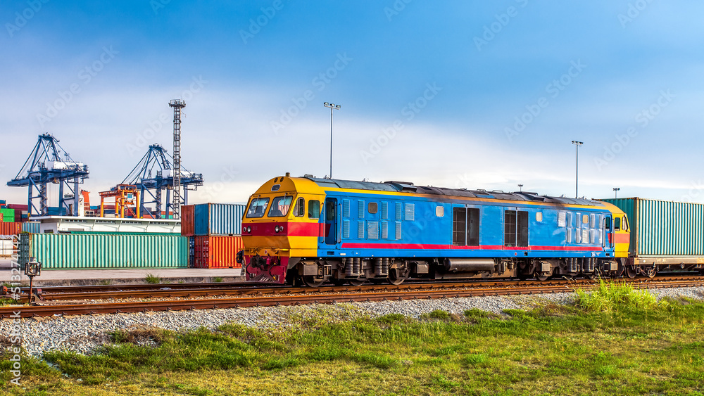 Container Cargo freight trains with Harbour Background using for Logistic Import Export Concept Container Cargo freight trains with Harbour Background using for Logistic Import Export Concept