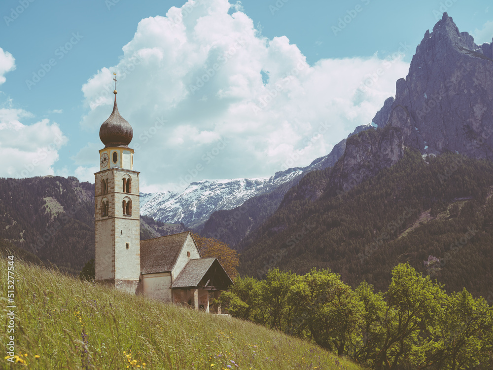 church in the mountains. the view from the top,  the dolomites, italy