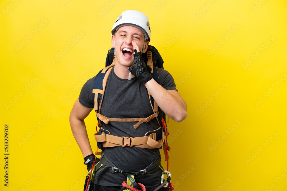 Young rock climber Brazilian man shouting with mouth wide open Young rock climber Brazilian man shouting with mouth wide open