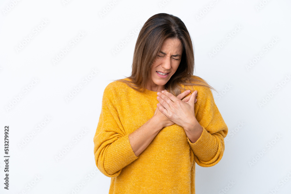 Middle age caucasian woman isolated on white background having a pain in the heart Middle age caucasian woman isolated on white background having a pain in the heart