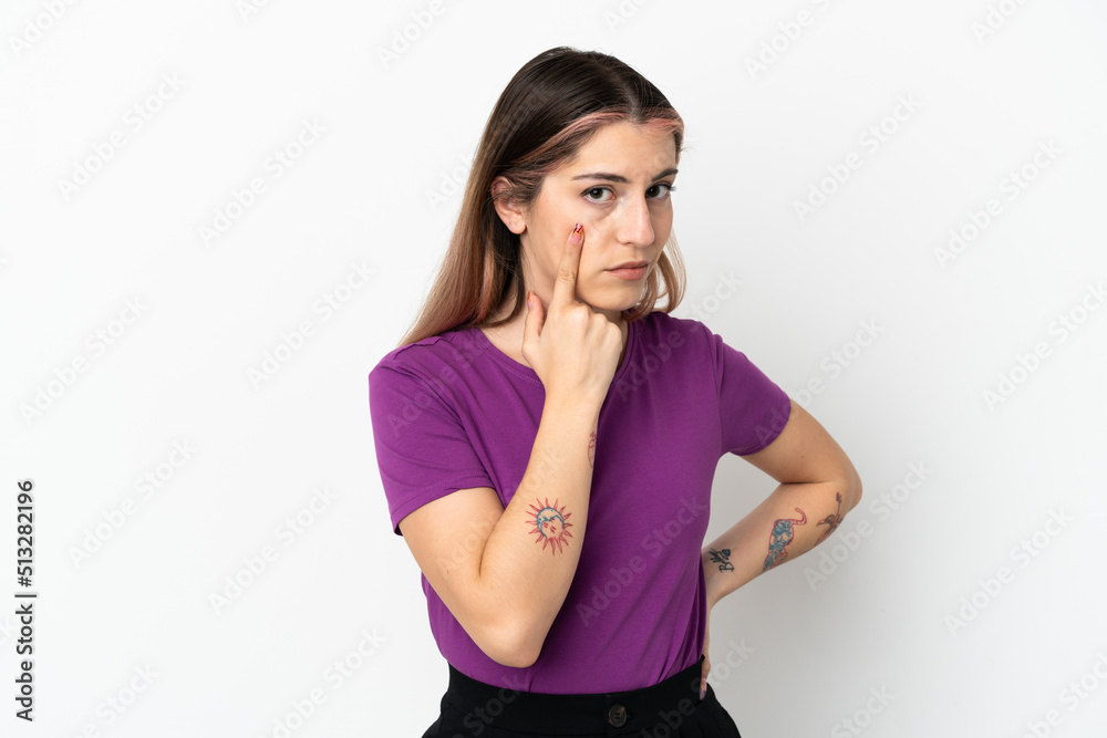 Young caucasian woman isolated on white background showing something Young caucasian woman isolated on white background showing something