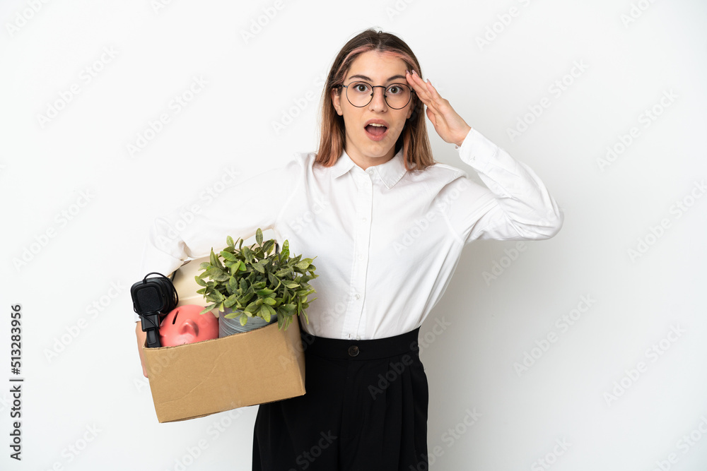Young caucasian woman moving in new home among boxes isolated on white background with surprise expression Young caucasian woman moving in new home among boxes isolated on white background with surprise expression