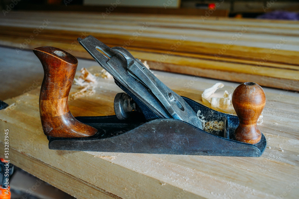 Carpentry planer, craftsman's tool in carpentry workshop, hand tool Carpentry planer, craftsman's tool in carpentry workshop, hand tool