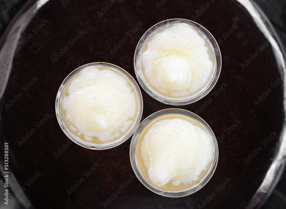 top view apple ice juice or wine smoothie and cool beer jelly in wine glass by 3 glasses on table for family welcome drink and fruit cocktail beverage to freshness on holiday vacation travel and relax top view apple ice juice or wine smoothie and cool beer jelly in wine glass by 3 glasses on table for family welcome drink and fruit cocktail beverage to freshness on holiday vacation travel and relax