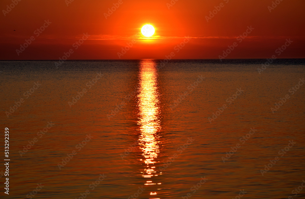 Crimson sunrise on the sea