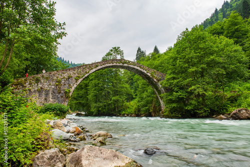 Stone bridge on Firtina Stream in Camlihemsin, Rize, Turkey. Beautiful nature landscape.