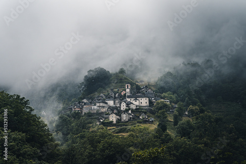 Ancient village of Corippo situated near Lavertezzo on a hill surrounded by forest and mountains in Canton Ticino, Switzerland.