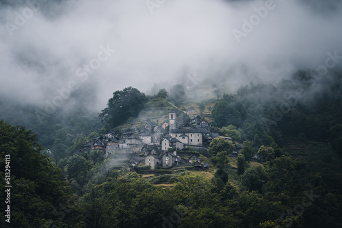 Ancient village of Corippo situated near Lavertezzo on a hill surrounded by forest and mountains in Canton Ticino, Switzerland.