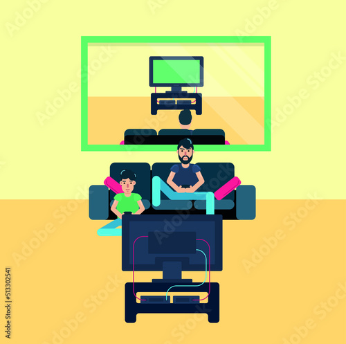 father and son sitting on sofa and playing playstation