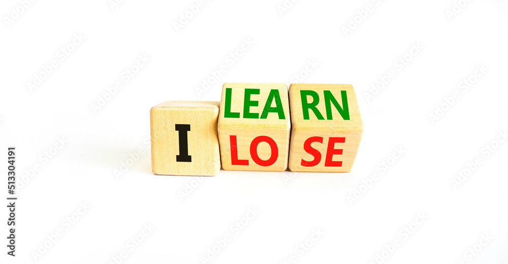I learn or lose symbol. Concept words I learn and I lose on wooden cubes. Beautiful white table white background. Business and i learn or lose concept. Copy space. I learn or lose symbol. Concept words I learn and I lose on wooden cubes. Beautiful white table white background. Business and i learn or lose concept. Copy space.