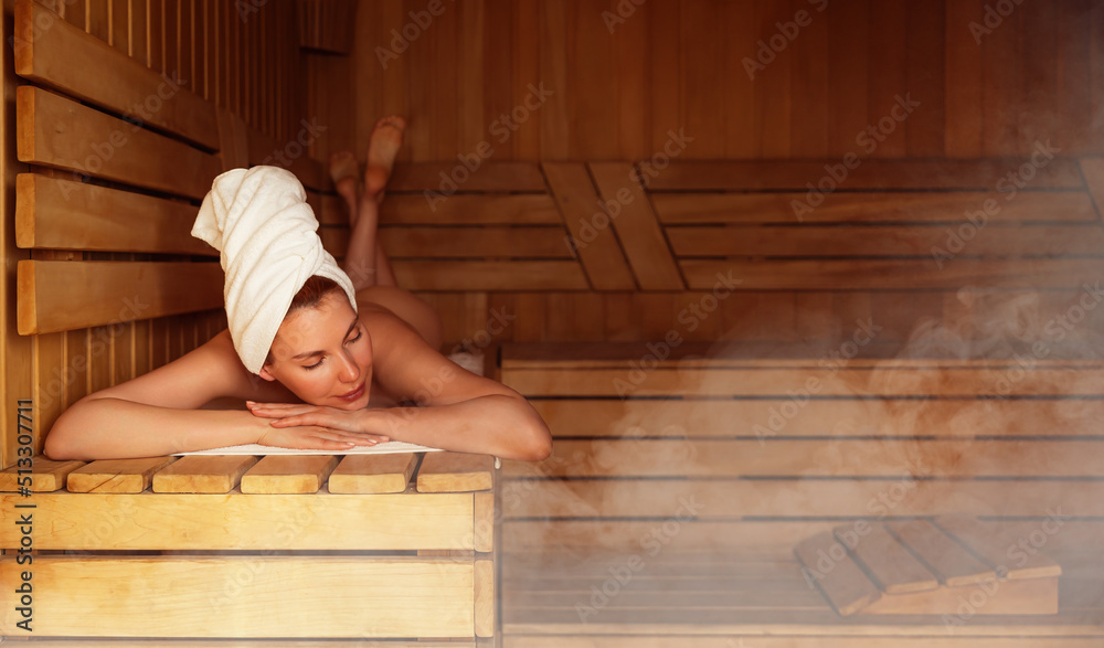 Woman wrapped in towel sauna hi-res stock photography and images