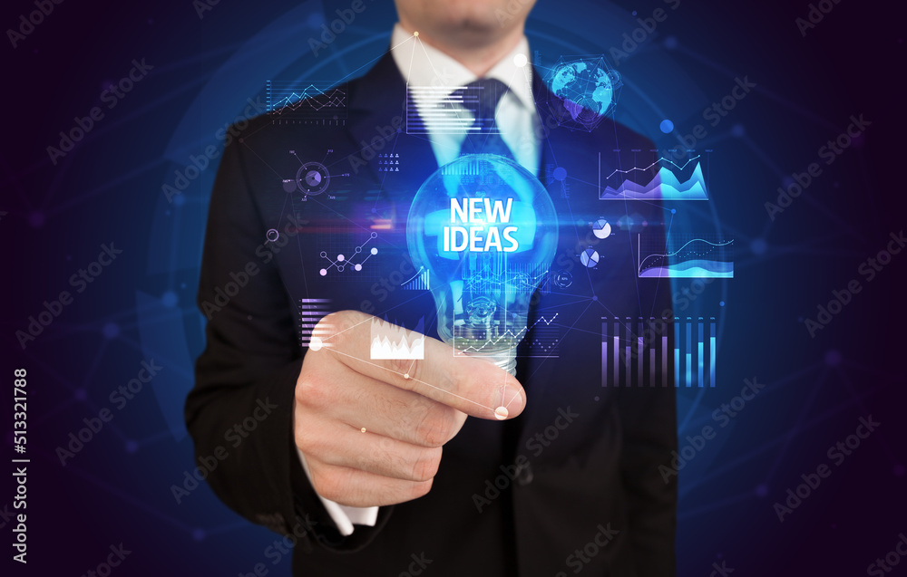 Businessman holding a light bulb, new business concept Businessman holding a light bulb, new business concept