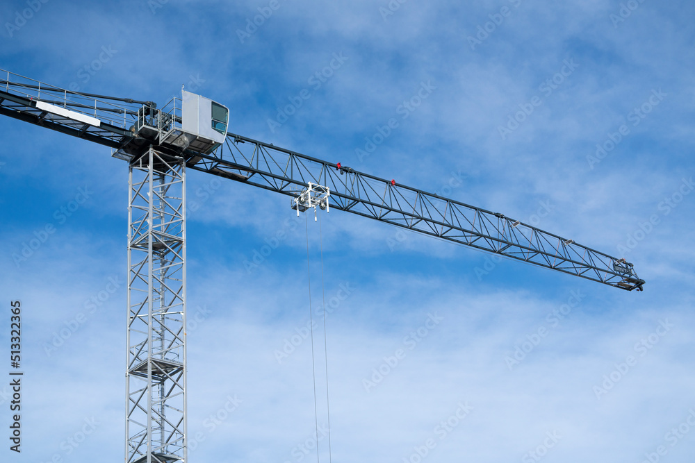 construction cranes and the blue sky with clouds. industrail concept construction cranes and the blue sky with clouds. industrail concept