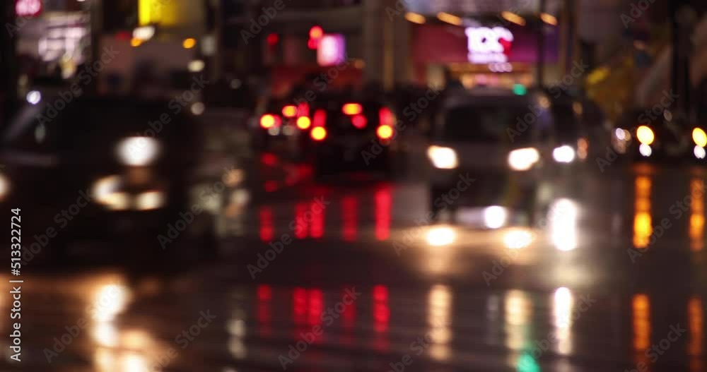 A high speed shooting of defocused traffic jam at Shibuya crossing rainy day A high speed shooting of defocused traffic jam at Shibuya crossing rainy day
