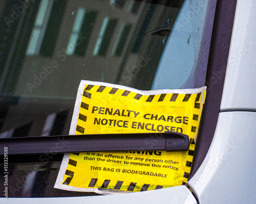 A penalty Charge Parking Ticket on a car windscreen  photo