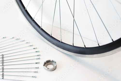rim and spokes of a bicycle wheel, wheel lacing, close-up on an isolated background