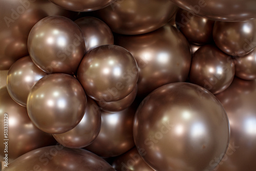 Background of brown-bronze inflatable gel balloons