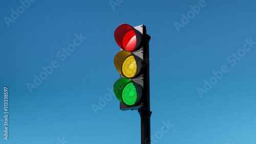 traffic light with red, yellow and green colors on isolated on blue sky background. Mock-up or source. 3d render photo