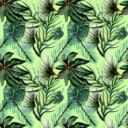 Foglie verdi tropicali su sfondo verde. Pattern senza cucitura dipinto ad acquerello photo