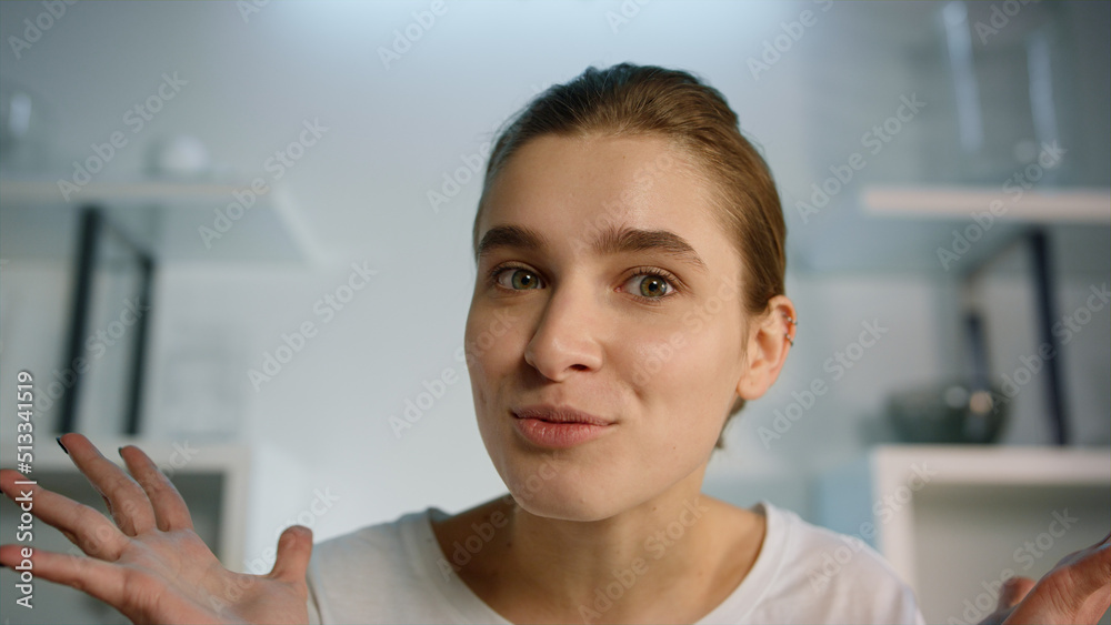Closeup emotional girl videocalling sharing exciting news. Web camera view. Closeup emotional girl videocalling sharing exciting news. Web camera view.