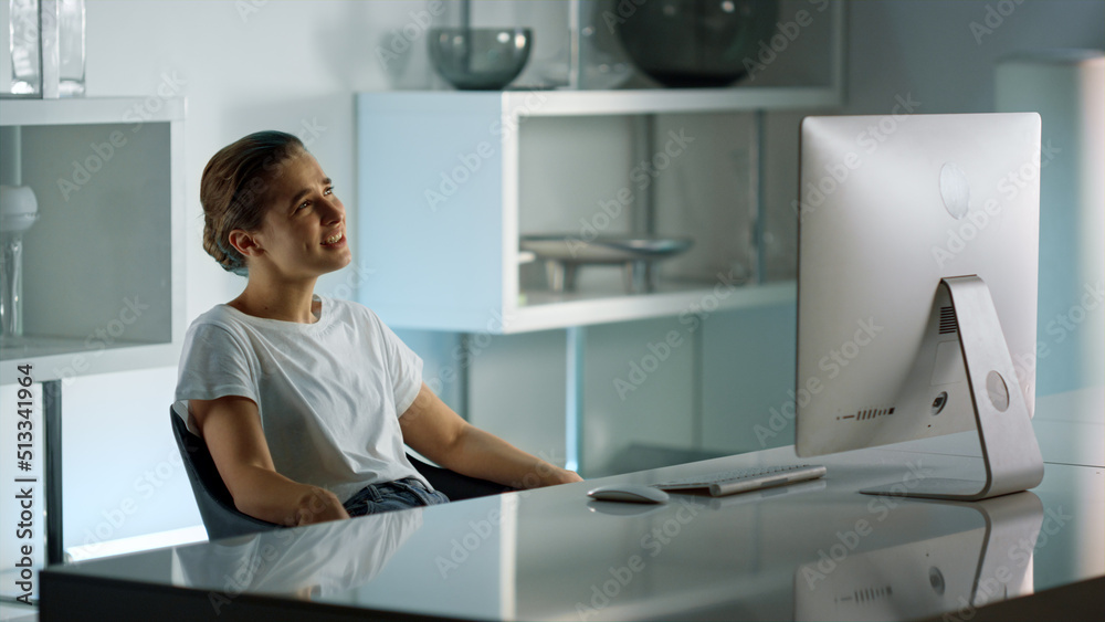 Relaxed girl having video call with friend at home. Joyful student chatting Relaxed girl having video call with friend at home. Joyful student chatting