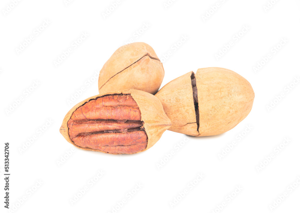 Three pecans in shell Three pecans in shell